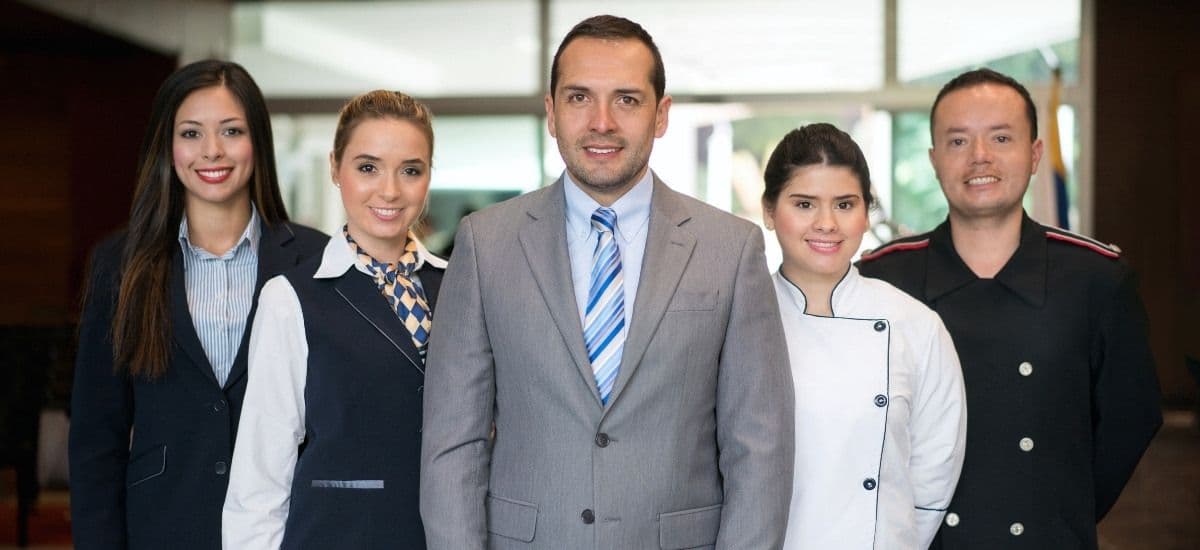 hotel staff ready to serve guests in the hotel they are employed in