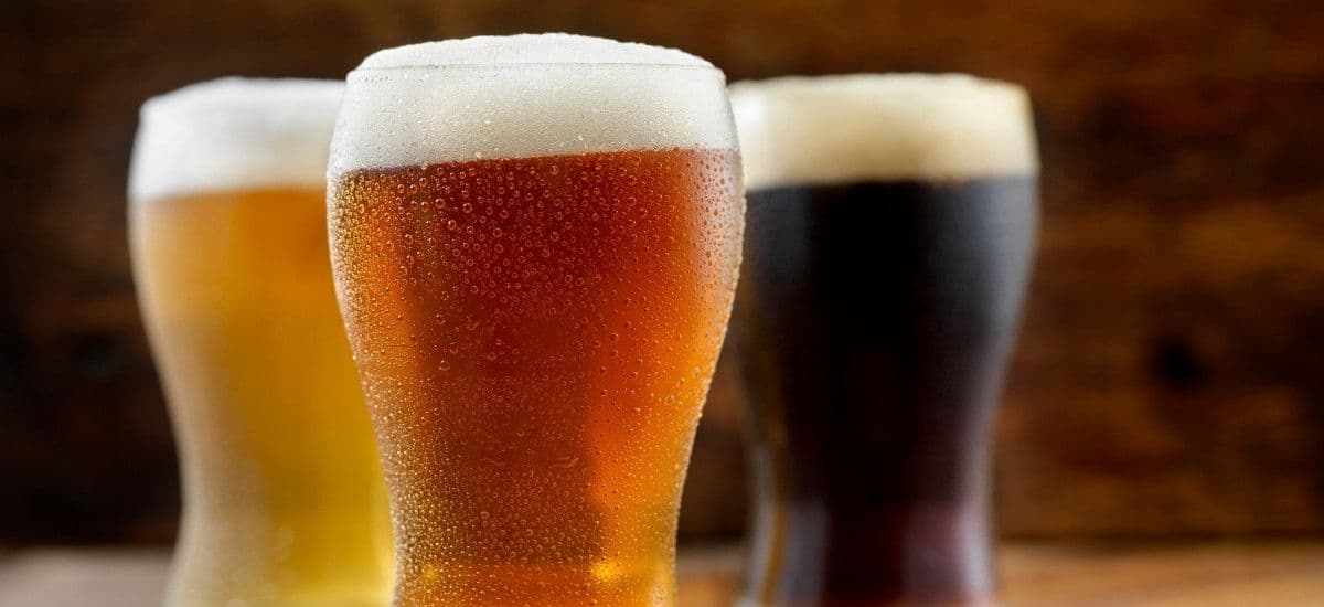 poured beers of lager ale and stout